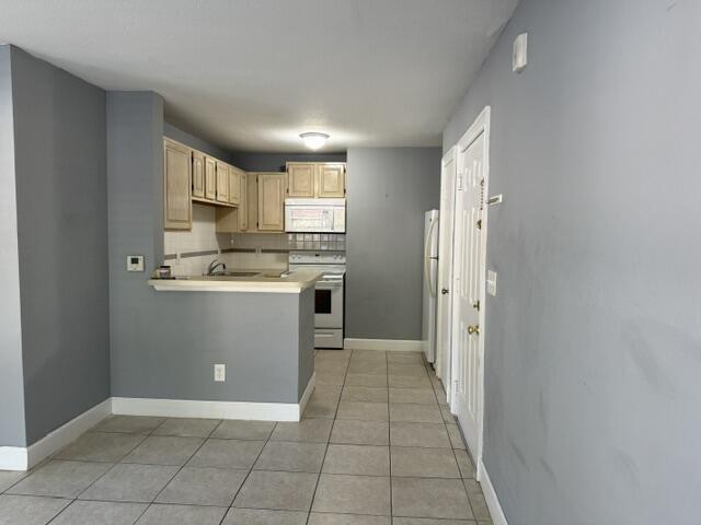 Building Photo - 1865 Palm Cove Blvd