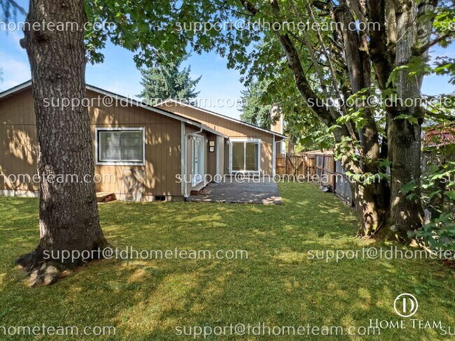 Building Photo - "Charming 3-Bedroom Retreat with Cozy Fire...
