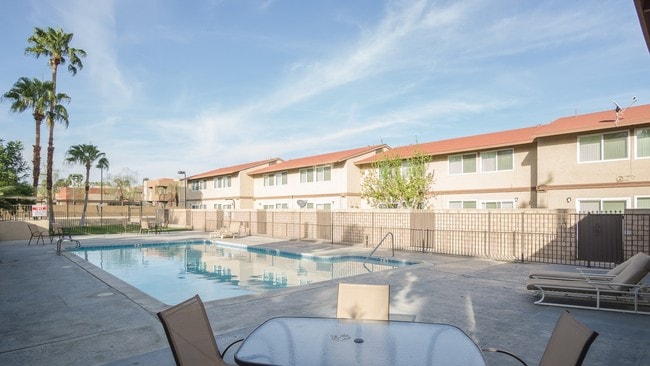 Love pool and sunbathing area. - Victoria Townhomes