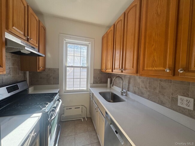 Building Photo - 214-06 36th Ave