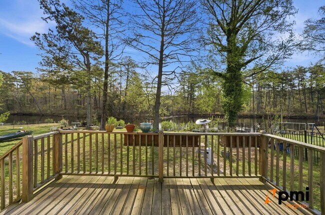 Building Photo - Stunning 5 Bedroom Waterfront Home with 2 car garage