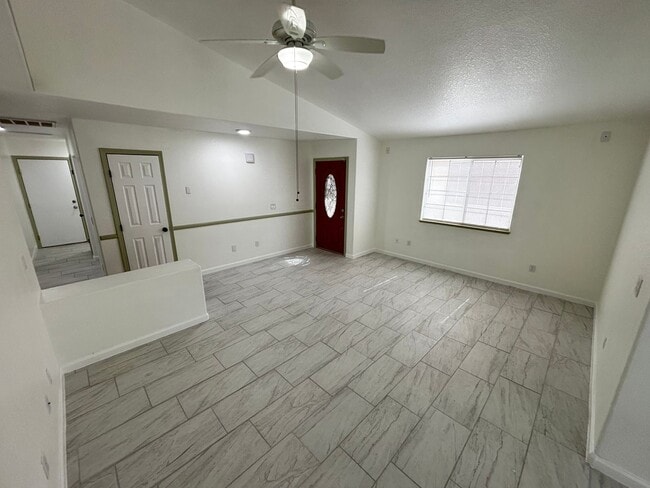 Building Photo - This inviting single-story home boasts a s...