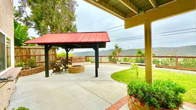 Building Photo - Spacious Two-Story Home with Three-Car Att...