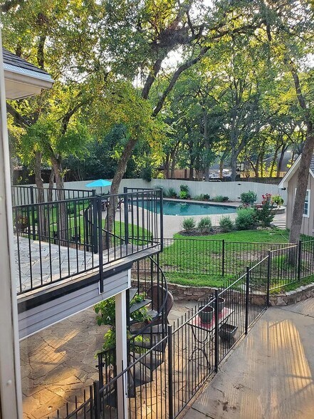 Backyard/Pool view from Bedroom #1 - 504 Oak Hollow Ln