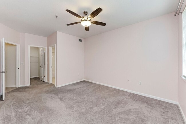 Building Photo - IMMACULATE 2nd Story condominium with so m...