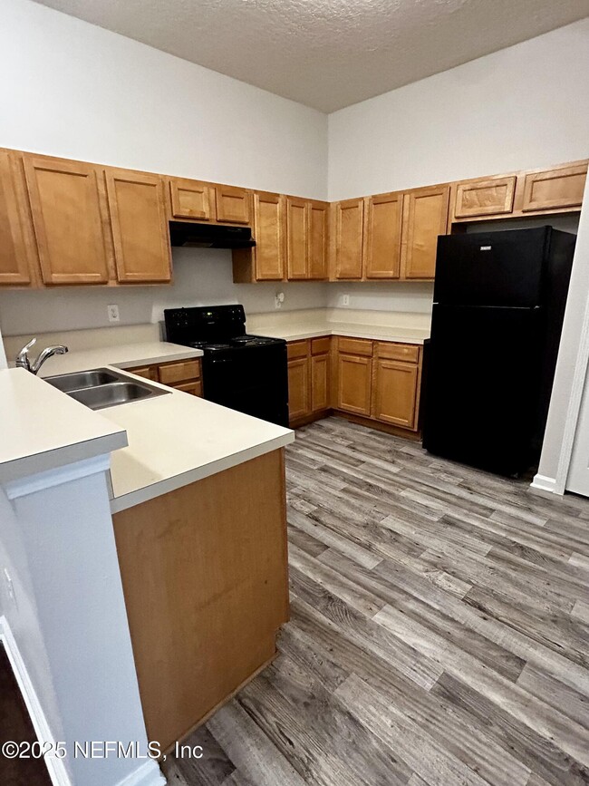 Building Photo - 6788 Manotak Oaks Dr