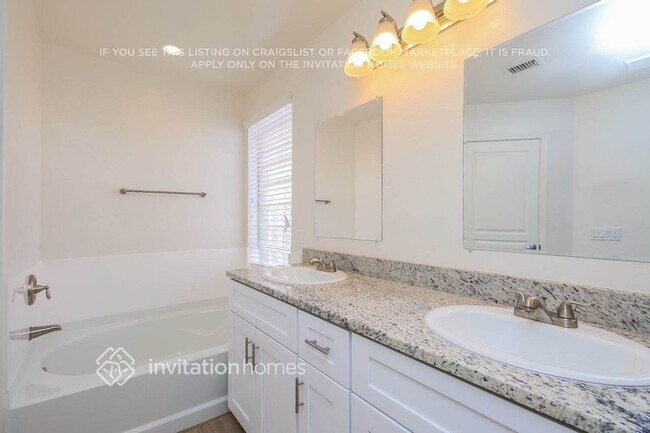 Building Photo - 10473 E Raintree Dr