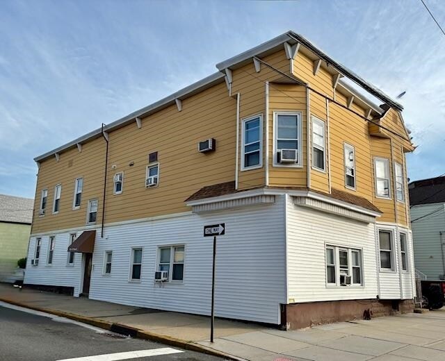 Building Photo - 115-117-117 Ave E
