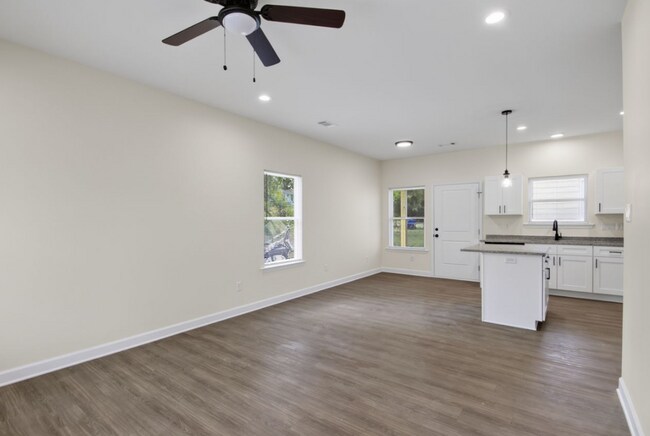 Building Photo - Inviting Home with Bright Interiors & Ceiling Fans Throughout - Comfortable Rental with Everyday ...