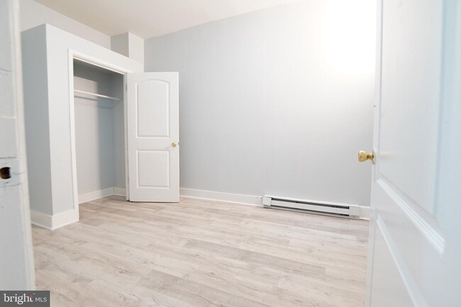 Building Photo - 7022 Woodland Ave