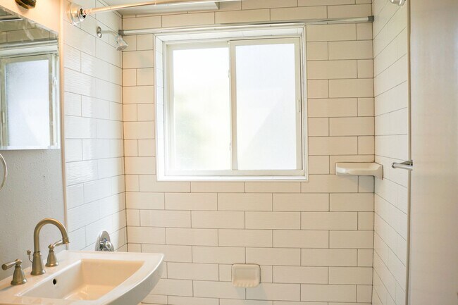 Building Photo - Great Mid-Century 1-Bdr w Dishwasher, Community Lawns + Pets OK!