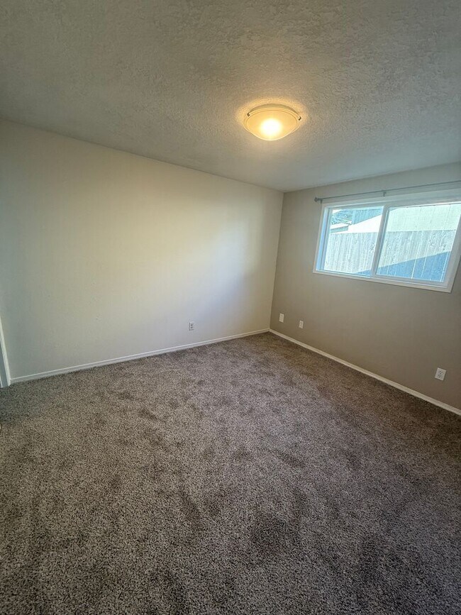 Building Photo - Updated 3+ Bedroom 2 Bath House with Large Fenced In Yard