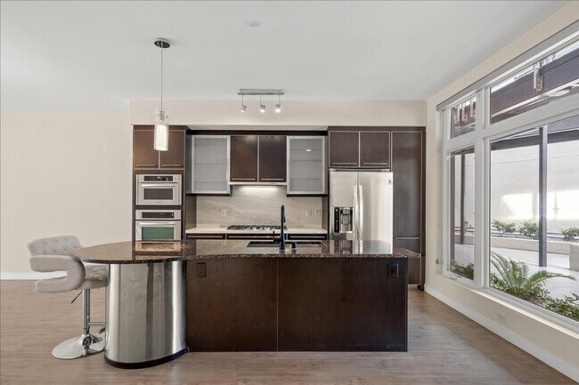 Building Photo - Resort Style Amenities in a Luxury, Modern 2 Bedroom Condo