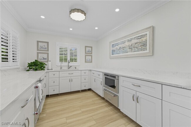 Building Photo - 7040 Pelican Bay Blvd