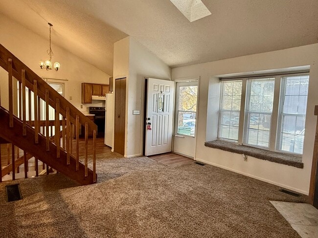 Building Photo - Open Tri-Level Townhome With Tons Of Space...