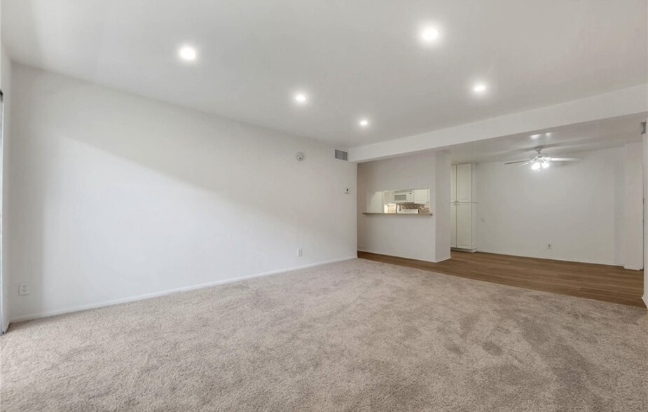 Replaced the carpet with wood vinyl floor. Will include a flat screen 65” TV mounted on the wall. - 5460 White Oak Ave