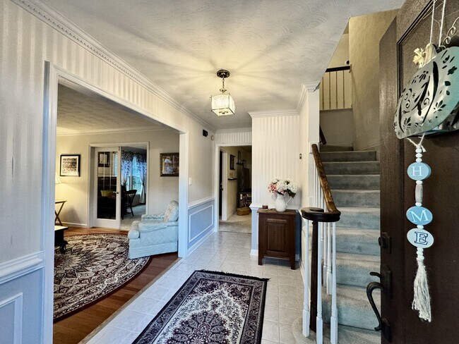 Building Photo - Fabulous 4-Bedroom Home w/2-Car Attached Garage! Dog Friendly - Screened Porch!