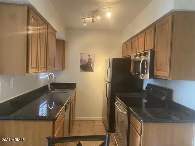 Building Photo - 5877 N Granite Reef Rd