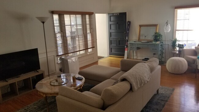 Living room toward front door - 9979 Robbins Dr