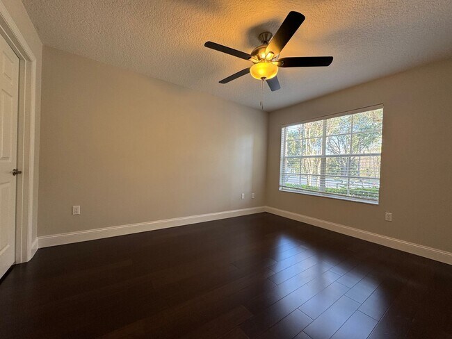 Building Photo - Oviedo 2/2 Condo with Tile & LVP Flooring, Updated Baths, New Paint & Appliances!