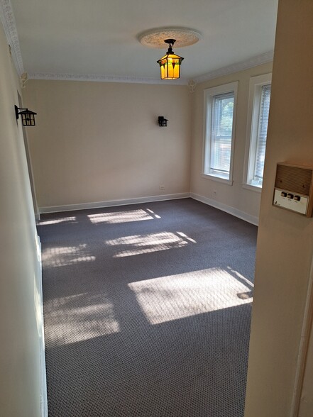 Living room with storage closet - 4215 N Campbell Ave