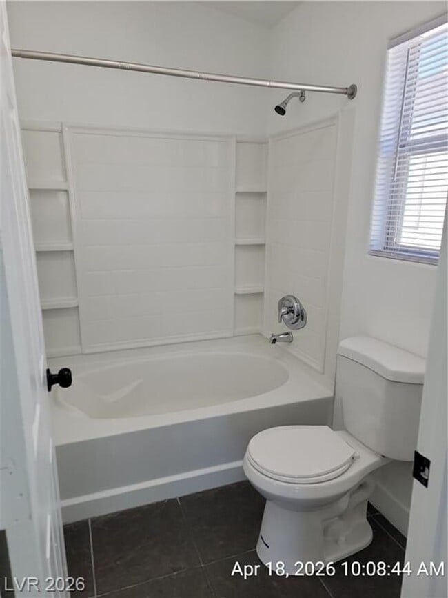 Building Photo - FANTASTIC SOUTHWEST TOWNHOME IN A GATED COMMUNITY!