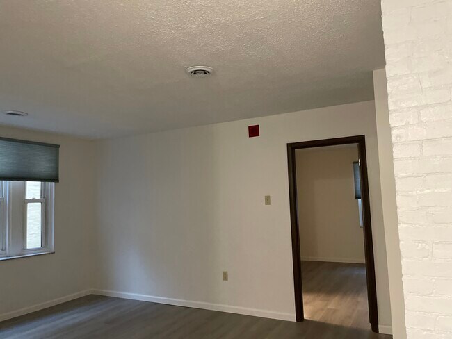 Living room and entrance to bedroom - 5523 Ellsworth Ave