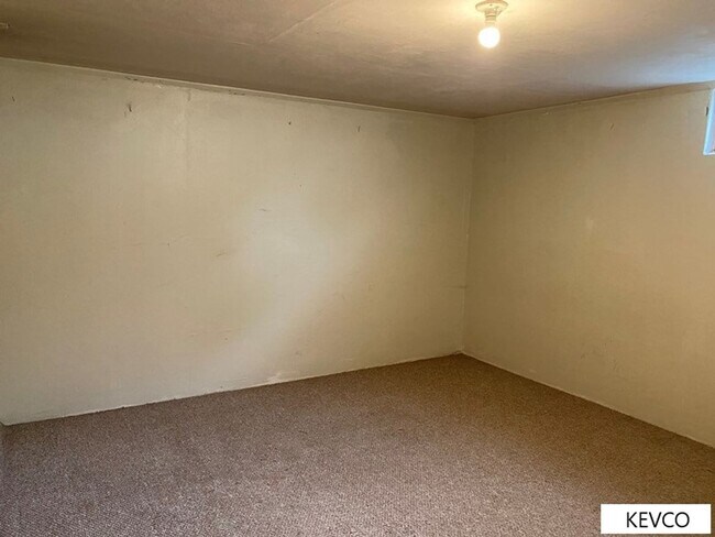Building Photo - Massive Three Bedroom Home with Yard!