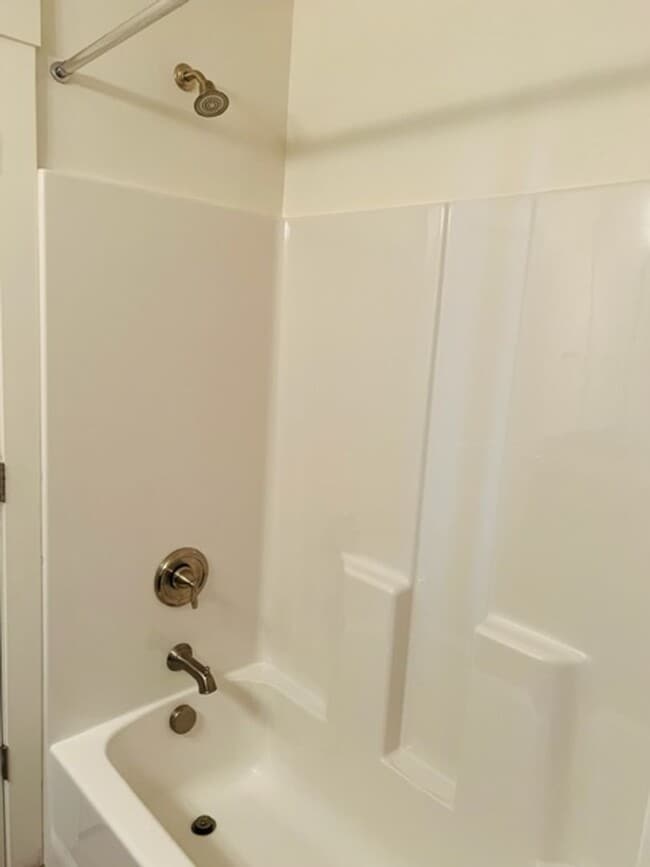 Building Photo - Beautiful 2018 townhome with 2 car garage and tall ceilings.