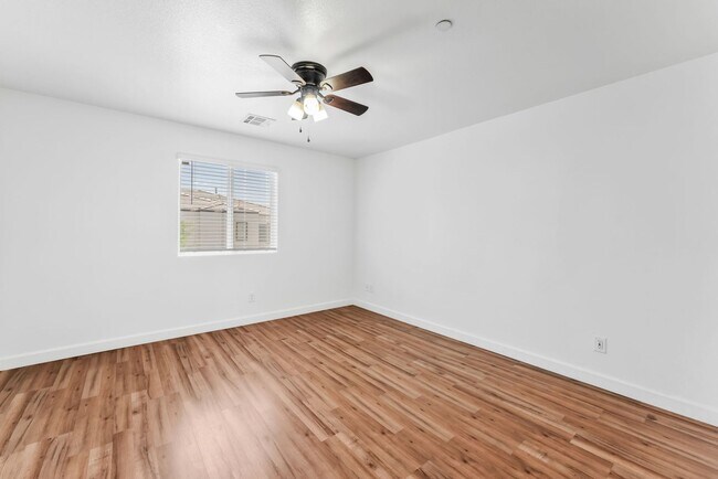 Building Photo - Modern Gated Townhome with Flexible Living Spaces & Stylish Finishes!