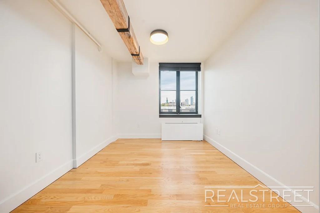 Building Photo - Stunning, Elegant, 2 Bedroom Right off Lorimer L train, Amazing Roof deck, Gym, Great Location!