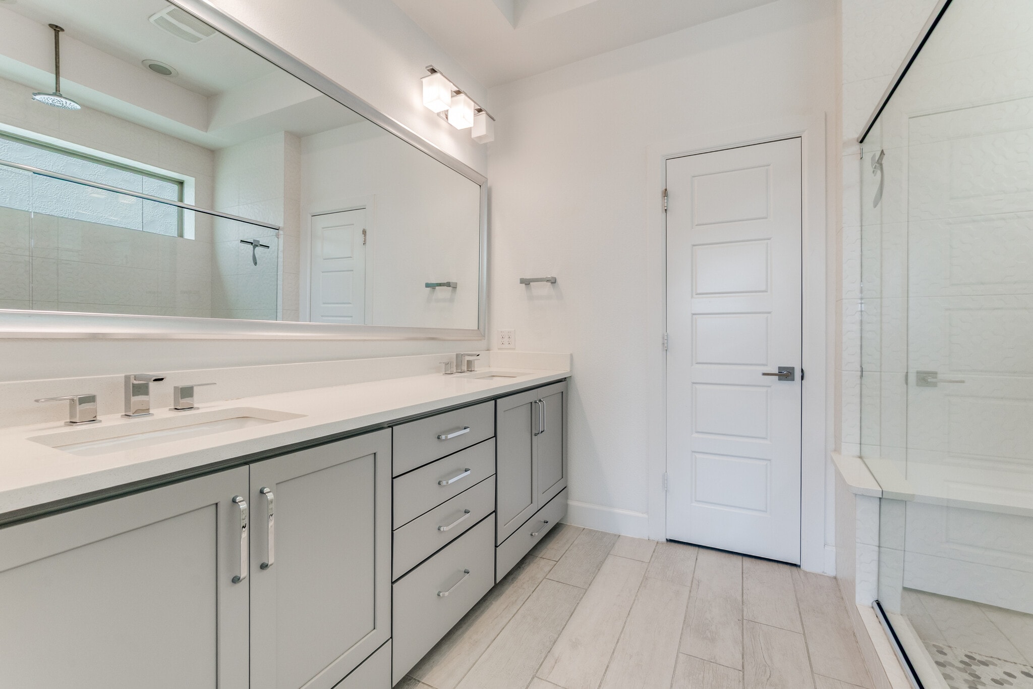 Primary Bathroom with double sinks, large tiled in shower and separate room for toilet - 2762 Yellow Jasmine Ln