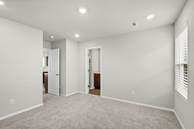 Building Photo - Charming Curb Appeal Meets Modern Comfort in the Monaco Plan!