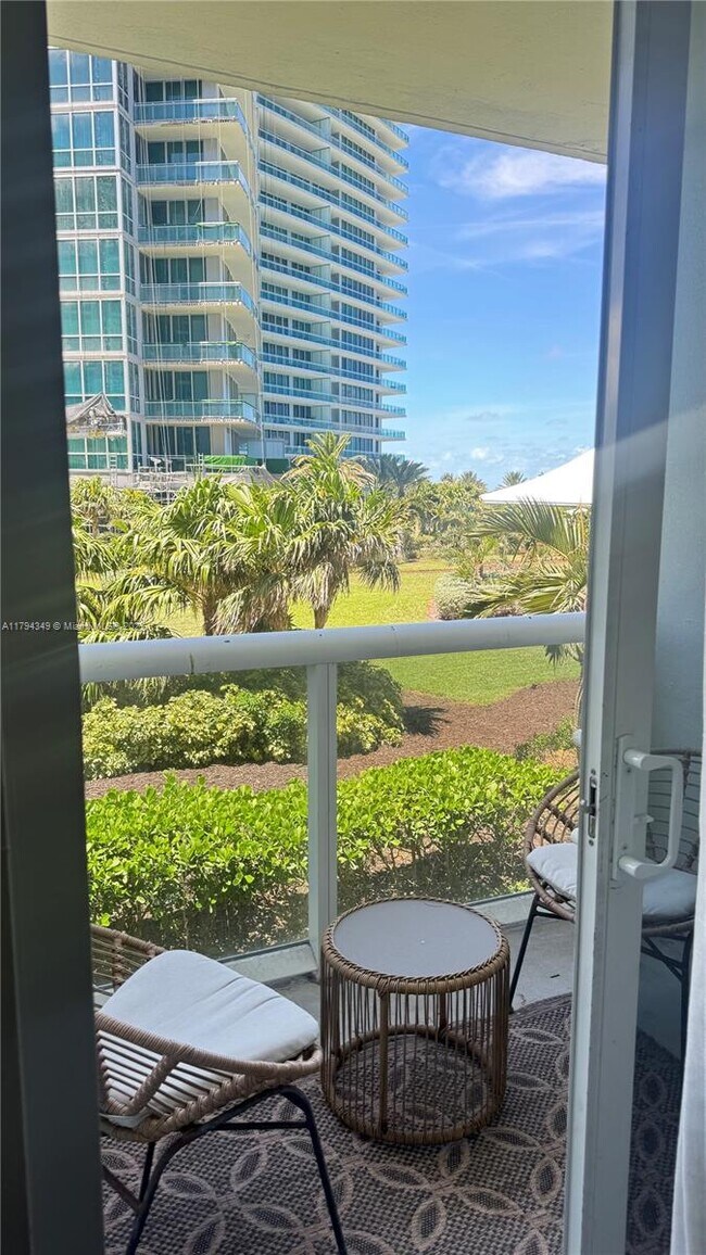 Building Photo - 10275 Collins Ave
