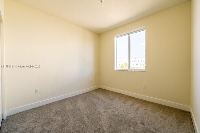 Building Photo - 6425 NW 103rd Pl