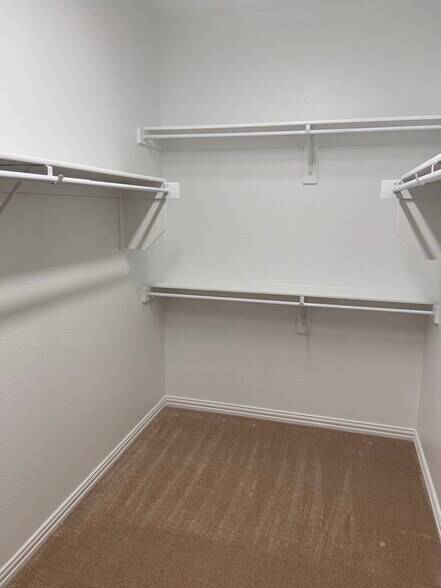 Walk-in closet at the Main Bedroom - 6214 Heron Dr