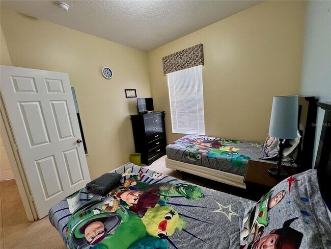Building Photo - 8127 Fan Palm Way