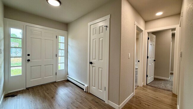 Building Photo - Stylish 3-Bedroom Remodel with Two Firepla...