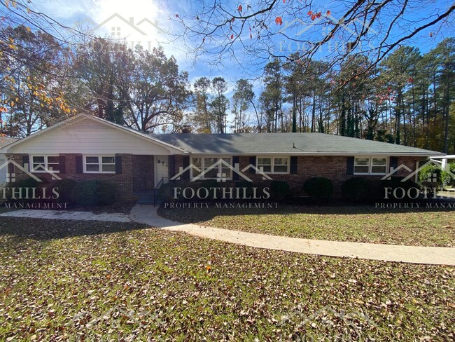 Primary Photo - 3-Bedroom Home with Screened Porch & New A...