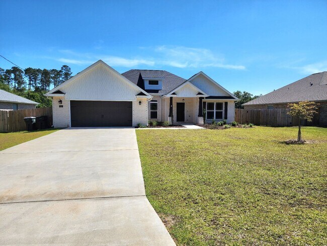 Building Photo - Welcome to this stunning 4-bedroom, 3-bath...