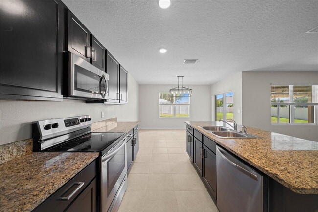 Building Photo - Move-In Ready! Beautiful 4-Bedroom Home with Modern Finishes & Room to Grow