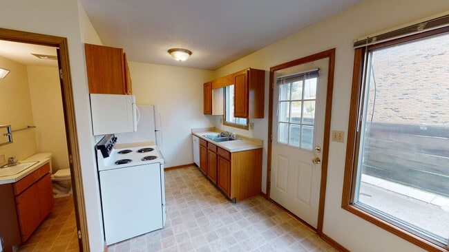 Building Photo - Sublease - 2 Bedroom Townhome Available March 9th, 2026