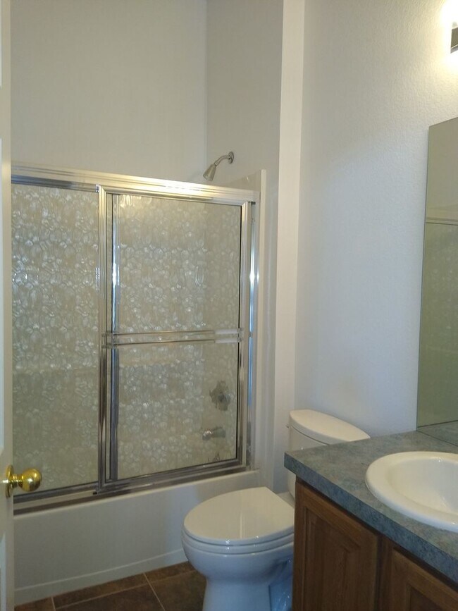 Building Photo - HUGE 3 Bedroom 3 Bath Home in Gated Community