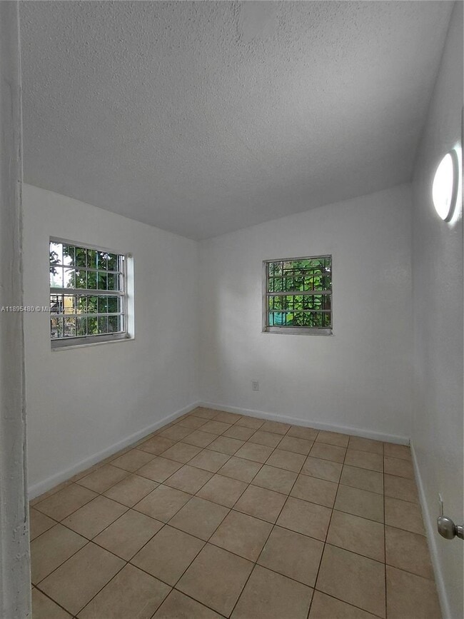 Building Photo - 7051 NW 21st Ave