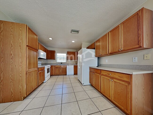 Building Photo - 5233 Mango Fruit St