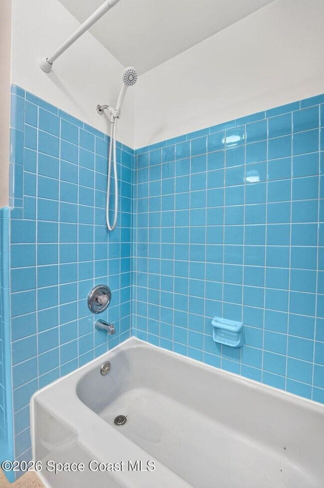 Building Photo - Welcome to this beautifully remodeled 4-bedroom, 3-bath home in the heart of Indialantic Beach!