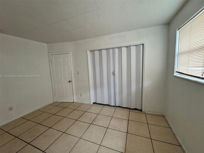 Building Photo - 2880 NW 12th Ct