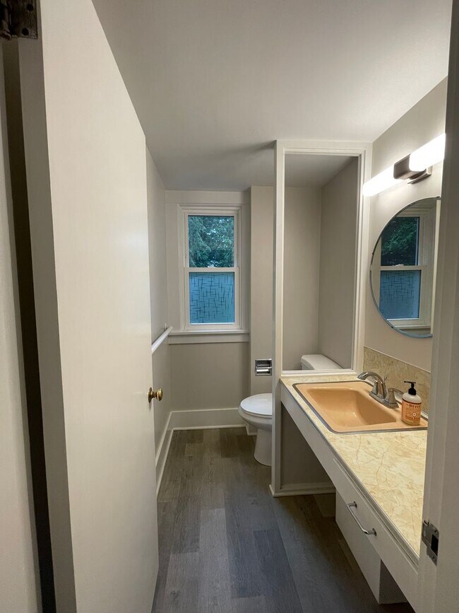 Building Photo - Elegant 4BR 2.5Bath Home with Fenced Yard & Garage Across from Seattle Prep**one month FREE rent**