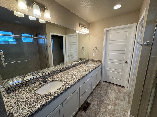Building Photo - Modern 3-Story Corner Lot Home with Hot Tu...