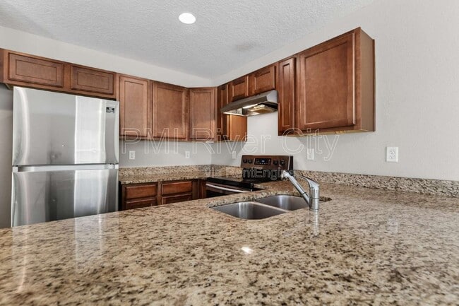 Building Photo - 7608 Rain Forest Dr N